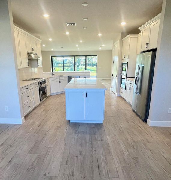 Furnished interior view inside a new home in Veranda Gardens, Port St. Lucie (Image 8).