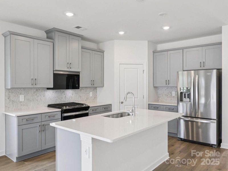 Photo is not of the actual home, but is an inspirational photo of builder’s model home and may depict options, furnishings, and/or decorator features that are not included Photo is not of the actual home, but is an inspirational photo of builder’s model home and may depict options, furnishings, and/or decorator features that are not included