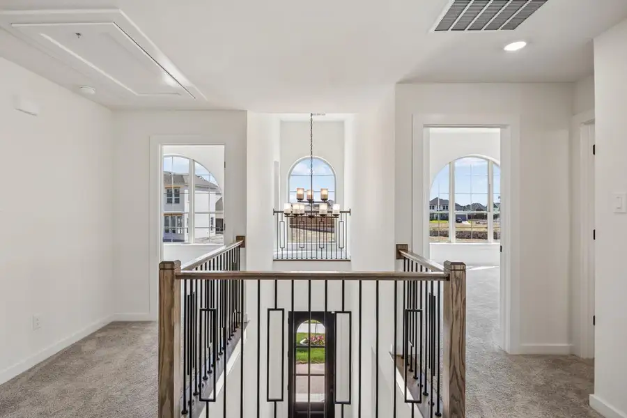 Furnished interior view inside a new home in Dominion of Pleasant Valley, Wylie (Image 10).