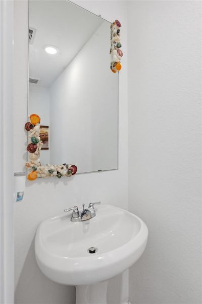 Half bathroom downstairs.  Toilet not pictured.