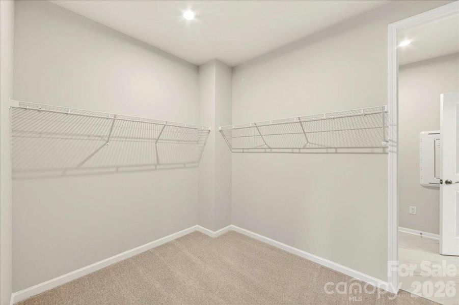 Large walk-in closet Large walk-in closet