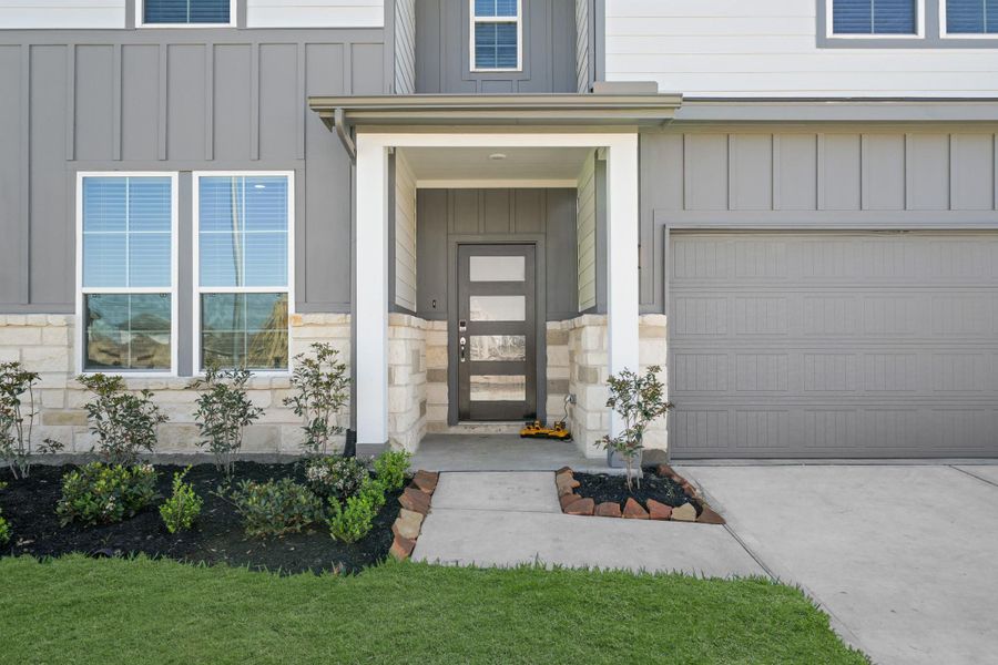 Exterior details and patio area of a home in Paloma at Sanford Farms, Waller (Image 3). Exterior details and patio area of a home in Paloma at Sanford Farms, Waller (Image 3).