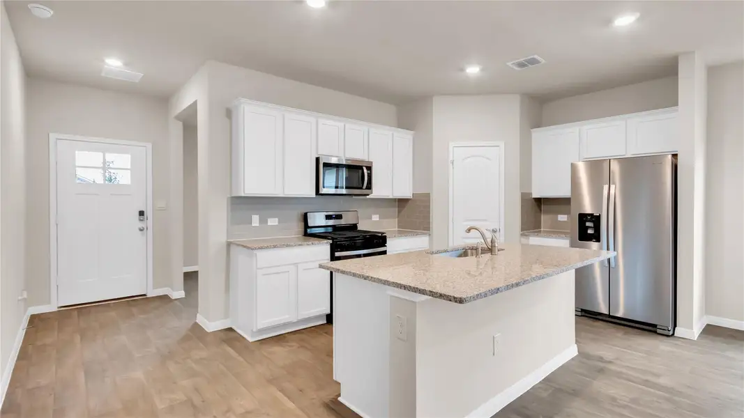 Furnished interior view inside a new home in Carillon, Manor (Image 9). Furnished interior view inside a new home in Carillon, Manor (Image 9).