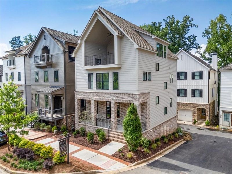 Front exterior of a new home in , Alpharetta, GA, highlighting curb appeal (Image 32). Front exterior of a new home in , Alpharetta, GA, highlighting curb appeal (Image 32).
