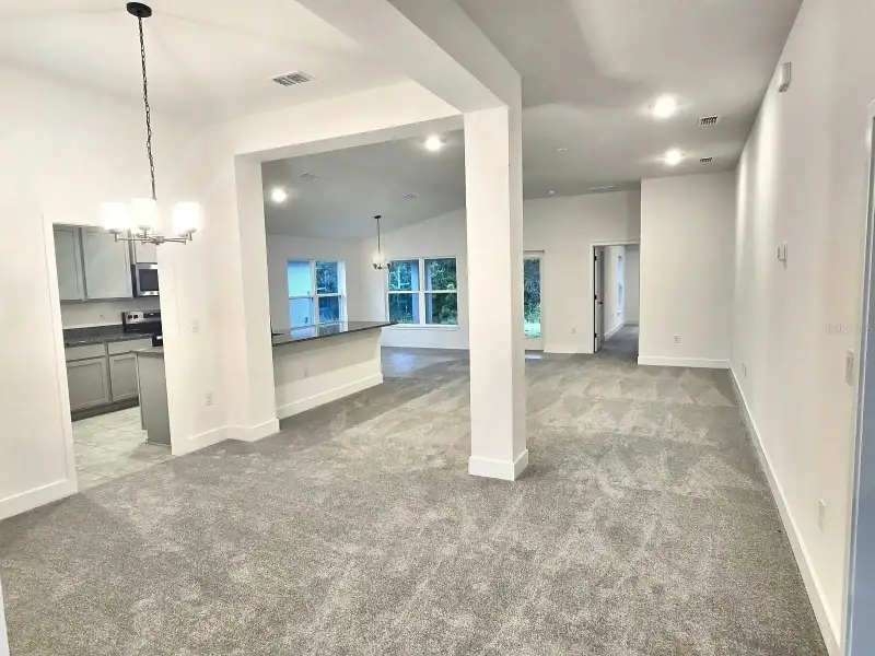 Spacious, unfurnished interior of a new home in Harmony Central, Harmony (Image 8).