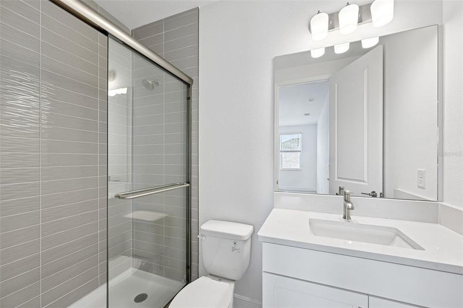 Furnished interior view inside a new home in Creeks Edge at Twin Rivers, Parrish (Image 12).