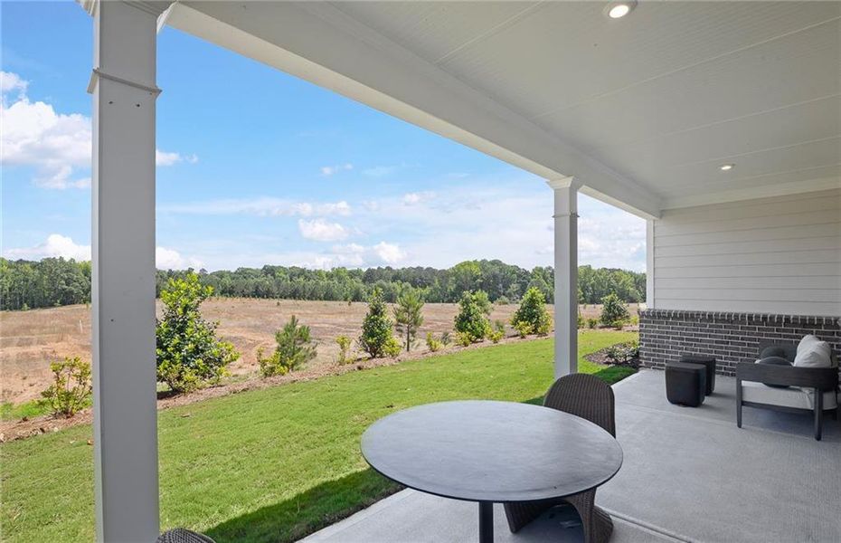 Exterior details and patio area of a home in Overland, Locust Grove (Image 3).