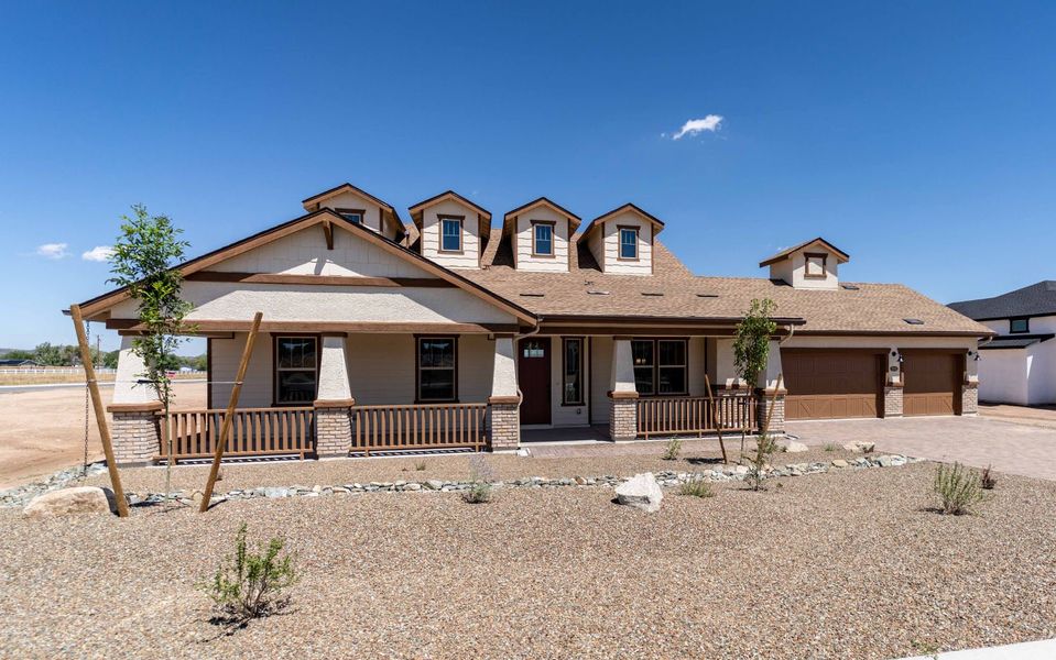 Front exterior of a new home in Heritage Pointe, Chino Valley, AZ, highlighting curb appeal (Image 16).