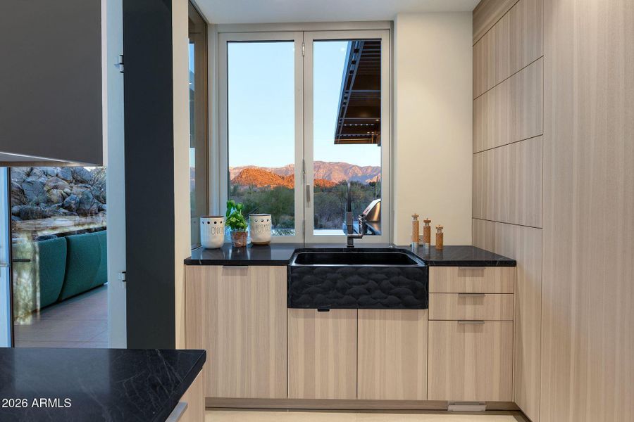 Back Kitchen with pass through to outdoo