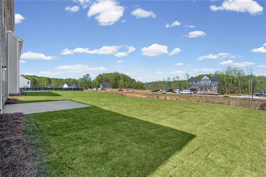 Exterior details and patio area of a home in Twin Lakes, Hoschton (Image 31).
