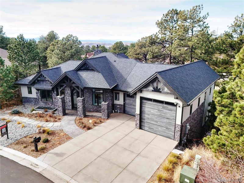 Front exterior of a new home in , Castle Rock, CO, highlighting curb appeal (Image 25).