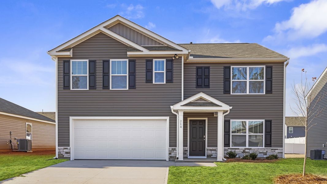 Front exterior of a new home in Bentley Park, Greenwood, SC, highlighting curb appeal (Image 1). Front exterior of a new home in Bentley Park, Greenwood, SC, highlighting curb appeal (Image 1).