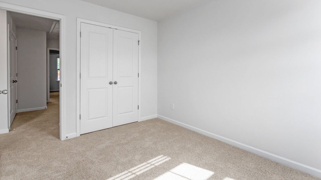 Representative unfurnished interior of a home built from the NEWTON by D.R. Horton in Henley Ridge, Graham (Image 17).