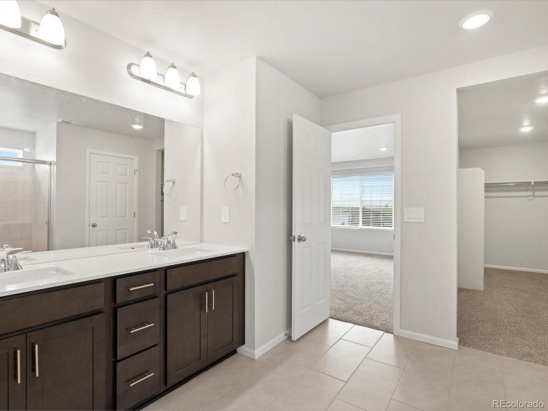 Furnished interior view inside a new home in Buffalo Highlands: The Canyon Collection, Commerce City (Image 6).