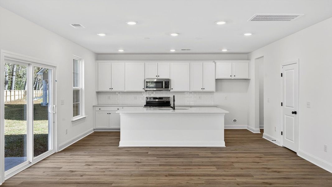 Furnished interior view inside a new home in Creekside at Andrews, Summerville (Image 9).