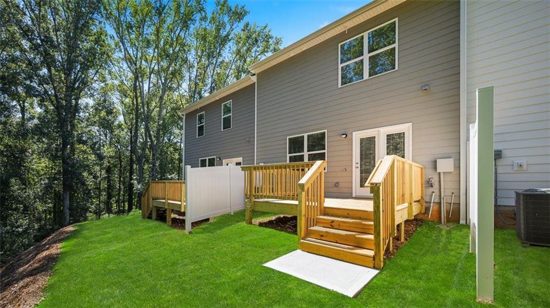 Exterior details and patio area of a home in Inverness at Sugarloaf, Lawrenceville (Image 2). Exterior details and patio area of a home in Inverness at Sugarloaf, Lawrenceville (Image 2).