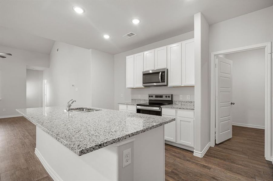 Furnished interior view inside a new home in Retreat at Fossil Creek, Fort Worth (Image 3). Furnished interior view inside a new home in Retreat at Fossil Creek, Fort Worth (Image 3).
