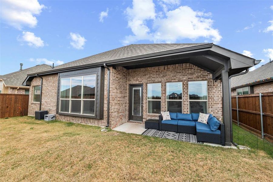 Exterior details and patio area of a home in Silo Mills - Select Series, Joshua (Image 3).