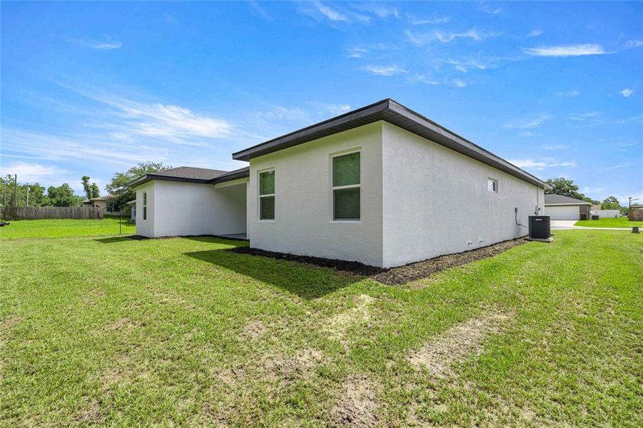 Exterior details and patio area of a home in , Ocala (Image 24).