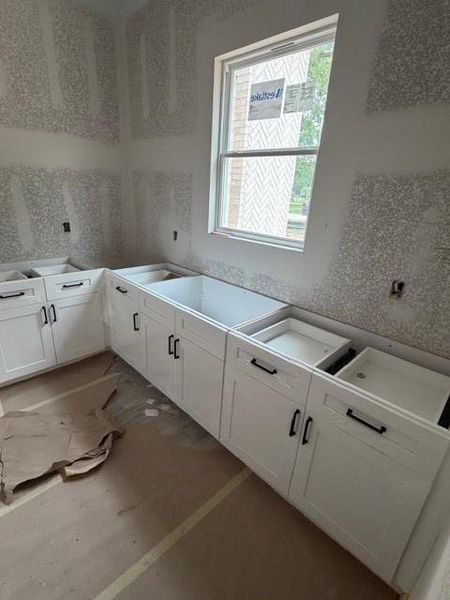In-progress construction of a new home in , Roman Forest, TX (Image 13).