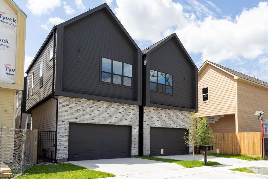 Front exterior of a new home in , Houston, TX, highlighting curb appeal (Image 28).