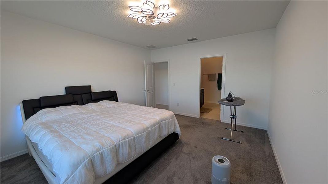 Furnished interior view inside a new home in North Park Isle, Plant City (Image 17).