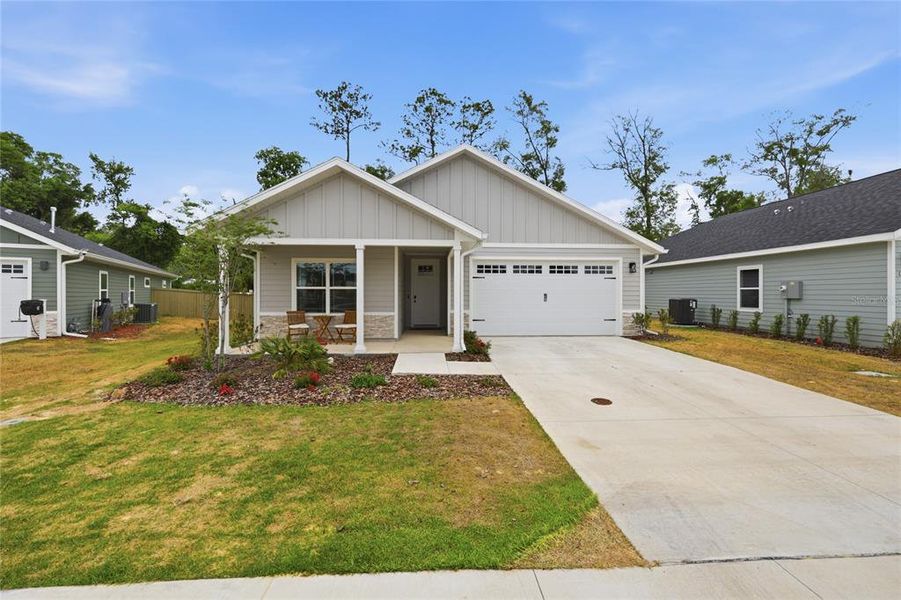 Front exterior of a new home in , Gainesville, FL, highlighting curb appeal (Image 26).