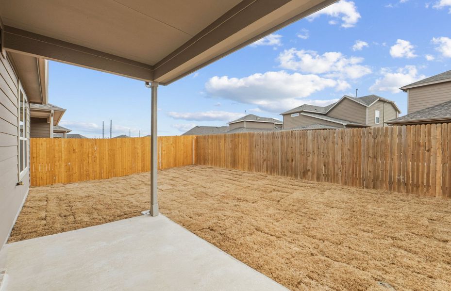 Exterior details and patio area of a home in Crosswinds, Kyle (Image 3).