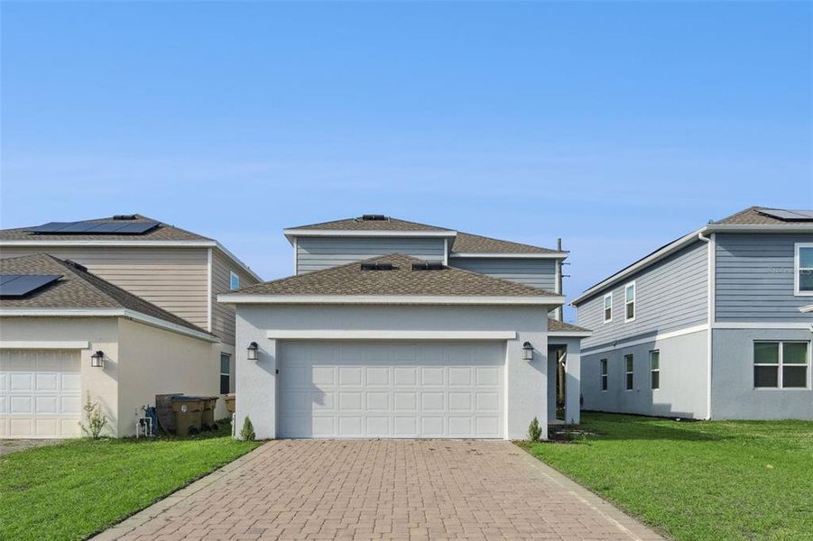 Front exterior of a new home in , St. Cloud, FL, highlighting curb appeal (Image 17). Front exterior of a new home in , St. Cloud, FL, highlighting curb appeal (Image 17).
