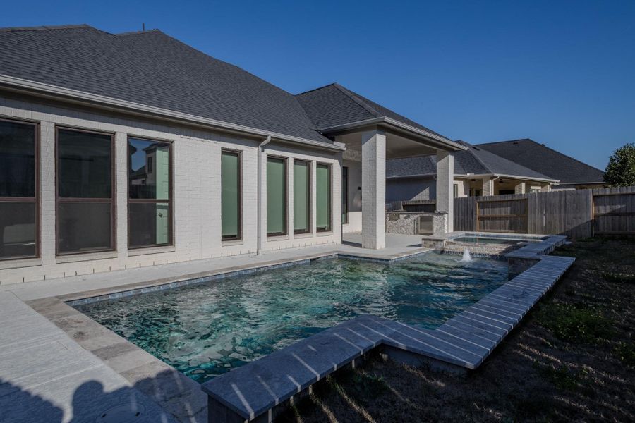 Exterior details and patio area of a home in Audubon, Magnolia (Image 25).