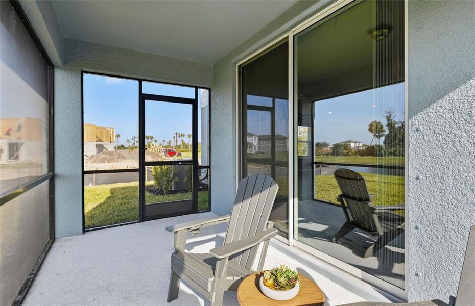 Exterior details and patio area of a home in Oakfield Trails, Parrish (Image 4).