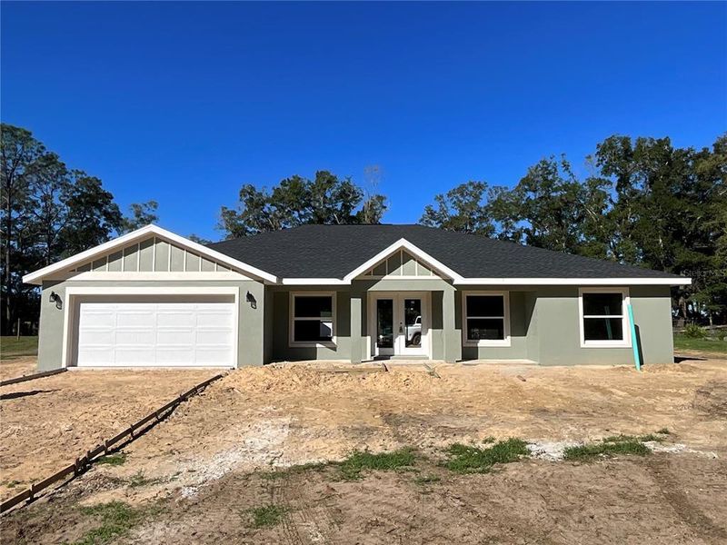 Front exterior of a new home in , Ocala, FL, highlighting curb appeal (Image 1). Front exterior of a new home in , Ocala, FL, highlighting curb appeal (Image 1).