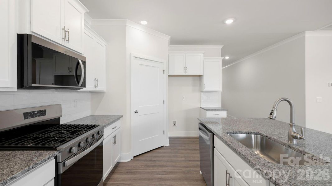 Furnished interior view inside a new home in Tap Root Farms, Hendersonville (Image 8).