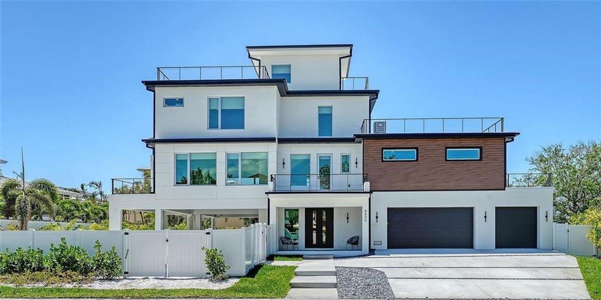 Front exterior of a new home in , Sarasota, FL, highlighting curb appeal (Image 2).