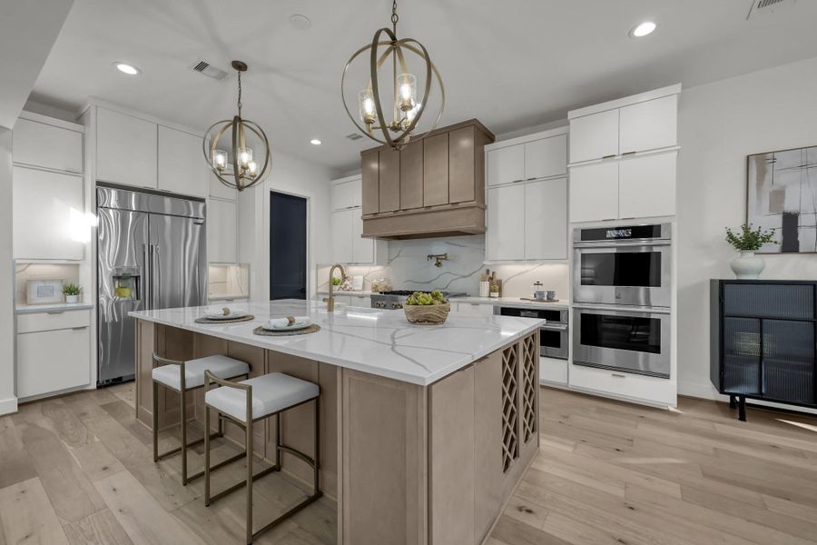 Kitchen view showing stainless steel appliances and ample counter space. Kitchen view showing stainless steel appliances and ample counter space.