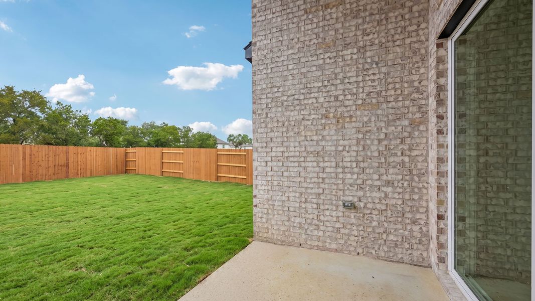 Exterior details and patio area of a home in The Enclave at Bar W Ranch, Leander (Image 21).