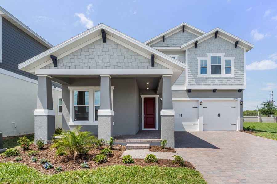 Representative exterior photo of a completed home built from the Frost by Rockwell Homes in Northlake at Ovation, Winter Garden, FL (Image 28). Representative exterior photo of a completed home built from the Frost by Rockwell Homes in Northlake at Ovation, Winter Garden, FL (Image 28).