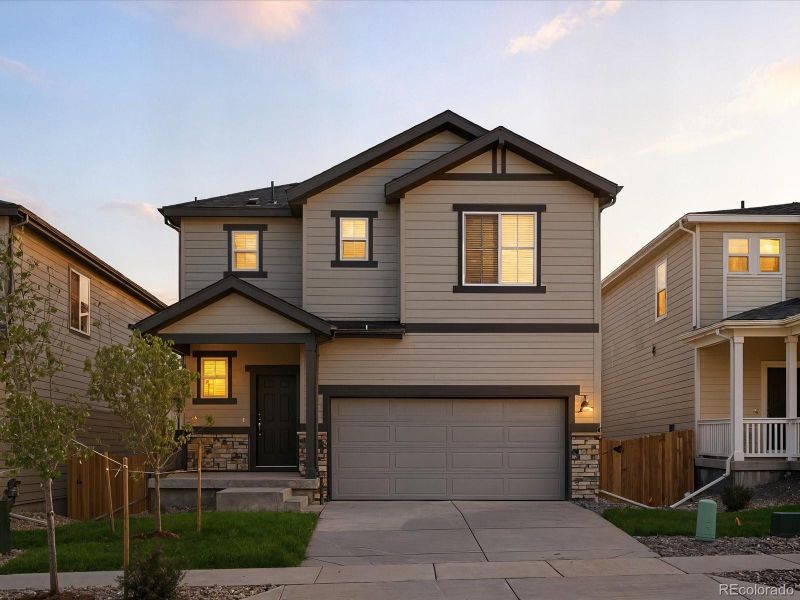Front exterior of a new home in Lake Bluff, Greeley, CO, highlighting curb appeal (Image 21). Front exterior of a new home in Lake Bluff, Greeley, CO, highlighting curb appeal (Image 21).