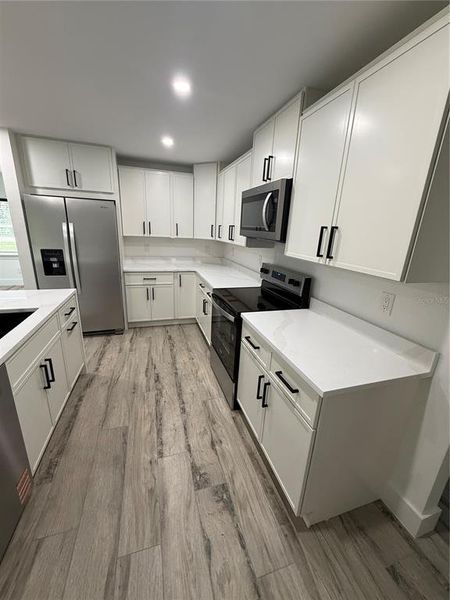 Furnished interior view inside a new home in , Port Charlotte (Image 6).