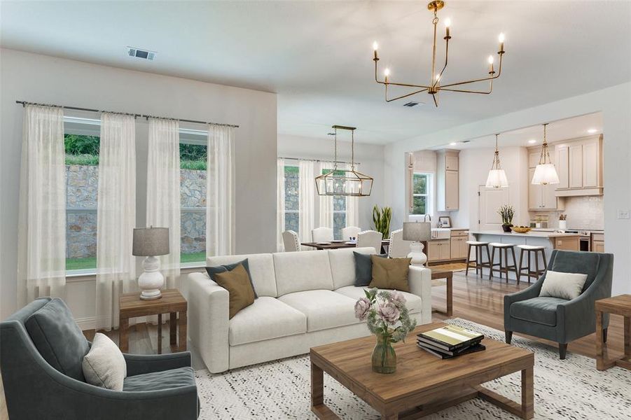 Living area with a chandelier and recessed lighting
