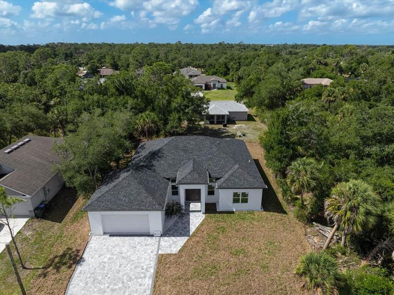 Front exterior of a new home in , North Port, FL, highlighting curb appeal (Image 23).