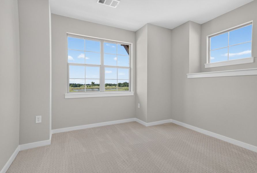 Spacious, unfurnished interior of a new home in The Tribute, The Colony (Image 42).