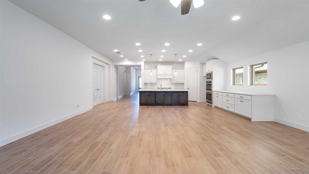 Spacious, unfurnished interior of a new home in The Heights At Uptown Celina 50', Celina (Image 8). Spacious, unfurnished interior of a new home in The Heights At Uptown Celina 50', Celina (Image 8).