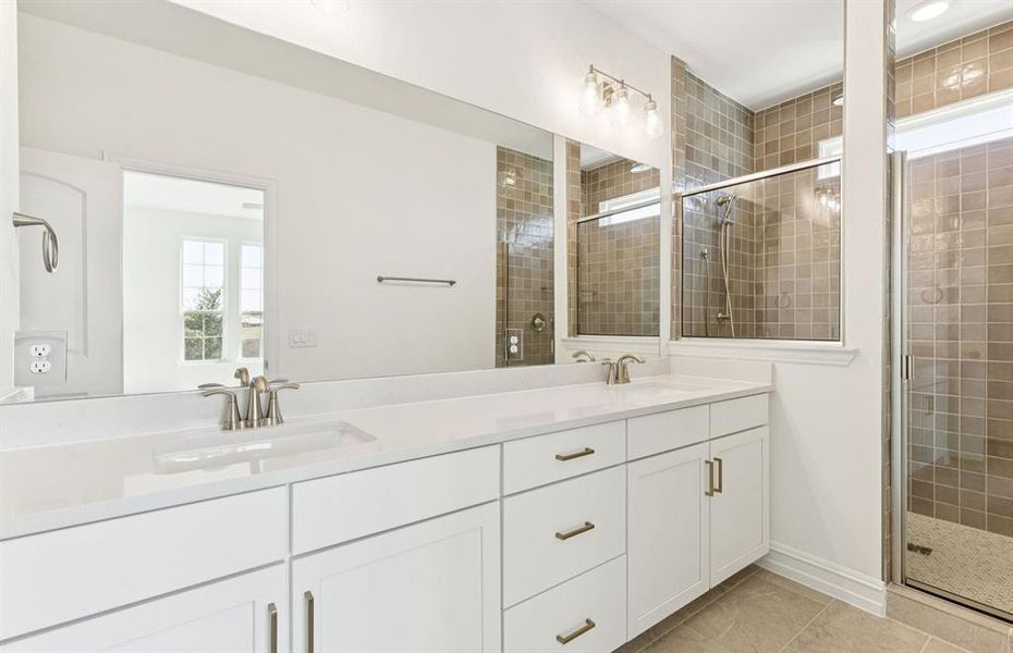 Spacious owner's bath with ample cabinet storage Spacious owner's bath with ample cabinet storage