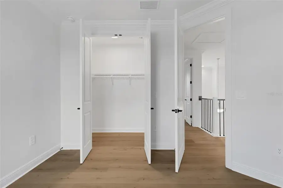 Spacious, unfurnished interior of a new home in Cassata Lakes, Nokomis (Image 79).