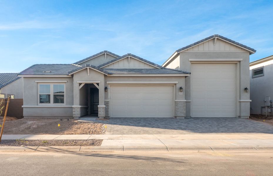 Front exterior of a new home in Artisan at Asante, Surprise, AZ, highlighting curb appeal (Image 21).