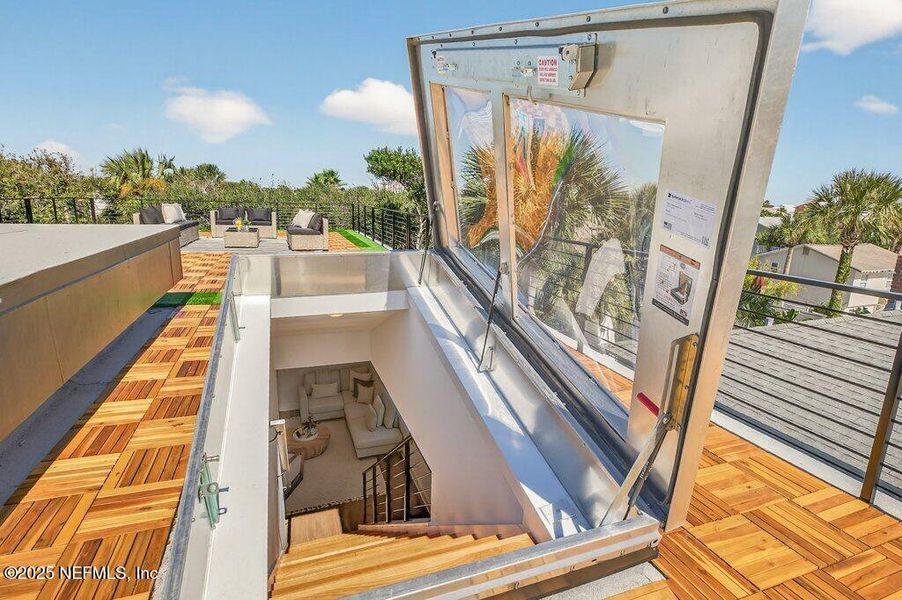 Exterior details and patio area of a home in , Neptune Beach (Image 53).