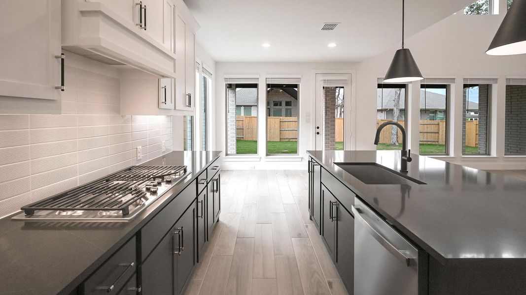 Furnished interior view inside a new home in 6 Creeks, Kyle (Image 14).