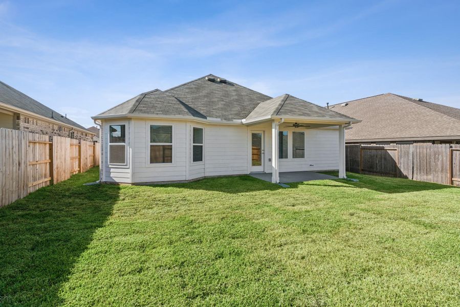 Exterior details and patio area of a home in Magnolia Ridge, Magnolia (Image 18). Exterior details and patio area of a home in Magnolia Ridge, Magnolia (Image 18).