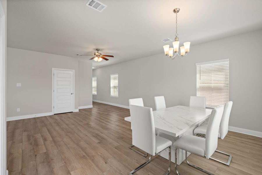 Furnished interior view inside a new home in Sunterra, Katy (Image 12).